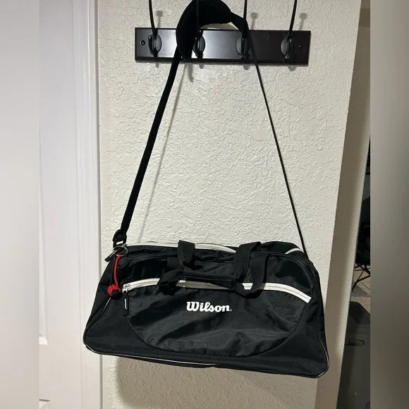 Wilson duffle bag/gym bag. Approximately 10 x 18 x 11.