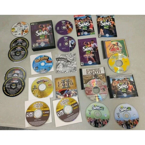 Vintage PC Game Lot (10) Sims, RollerCoaster Tycoon Empire Earth Carmen Sandiego