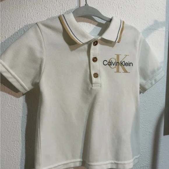 Calvin Klein Kids Cream Polo Shirt with Gold Accents