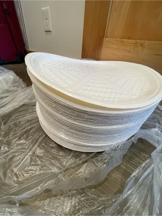 134 14” Stack of White Disposable pizza pan Trays