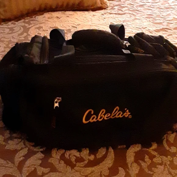 Cabela's black duffel bag gold embroidered logo 12