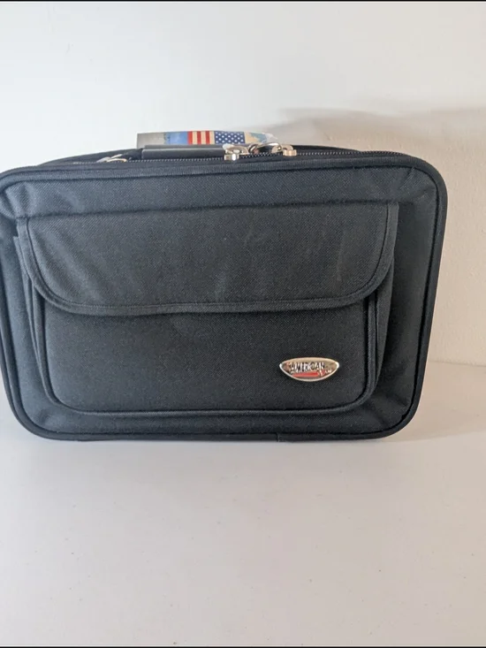New with tags American Uni travel laptop and document organizer bag in black.