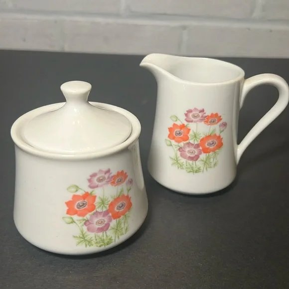 Vintage white porcelain cream‎ and sugar with floral design