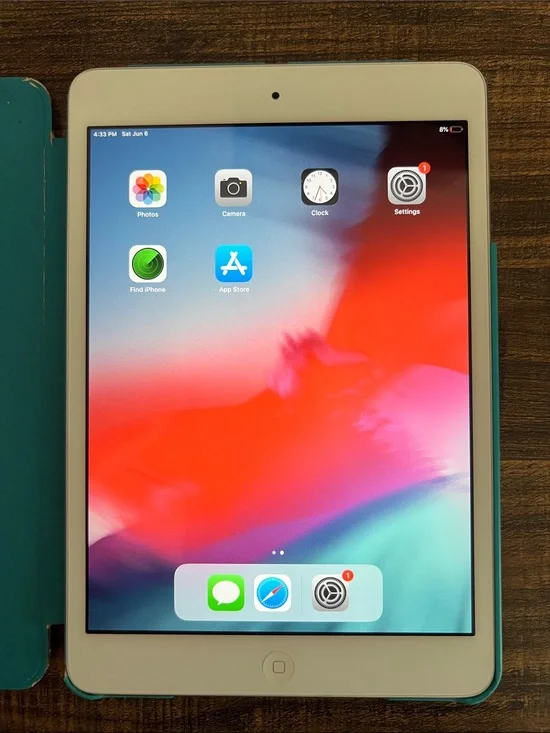 Apple iPad Mini White Tablet with Teal Case Accents