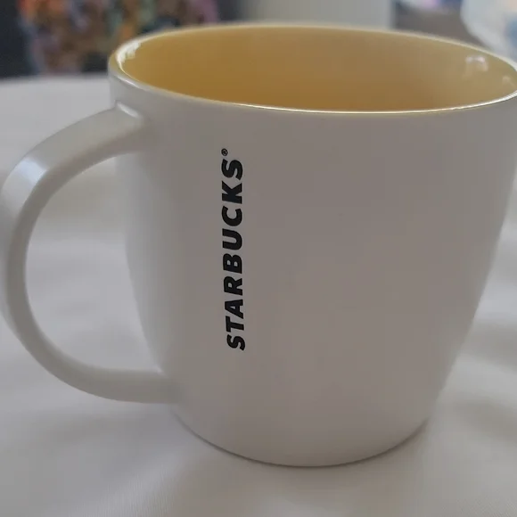 Starbucks 2011 New Bone China White Coffee Mug W/ Yellow Liner.