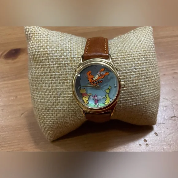 Disney: Pooh, Piglet, Rabbit, parachuting Tiger Disney Catalog gold brown watch.