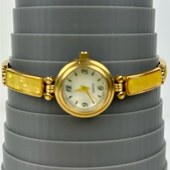 Elegant Avon Gold Tone Watch with Yellow Accents, 1