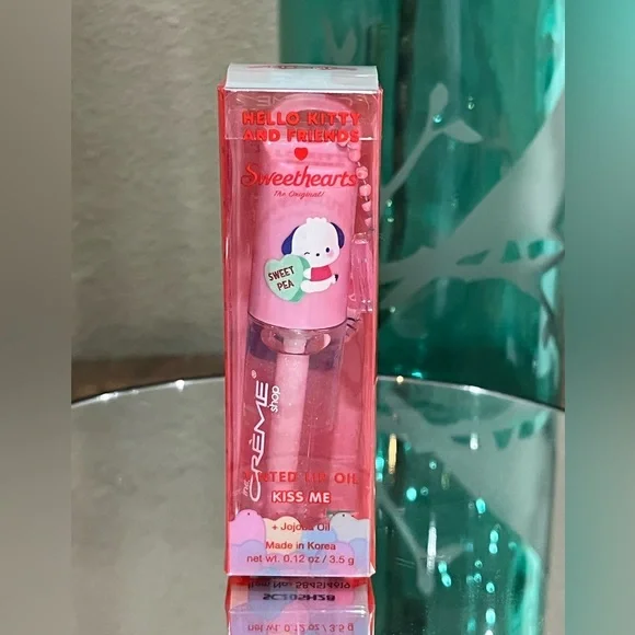 The Creme Shop x Hello Kitty Sweethearts Lip Oil in Kiss Me, new!