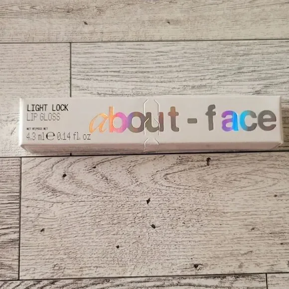 About Face Light Lock Lip Gloss in Angel on Fire