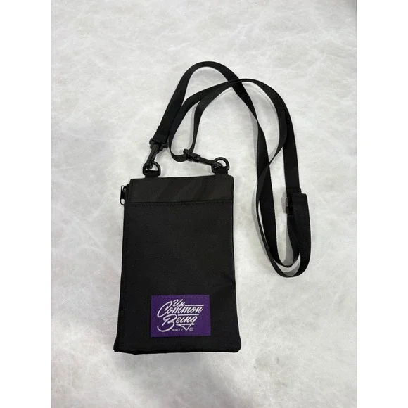 Uncommon Being Black Nylon Crossbody Neck Pouch‎ Utility Bag Purple Logo Patch