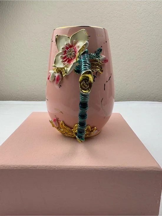 Pink ceramic enamel mug decorated with a 3D floral, rhinestones, and gold trim.