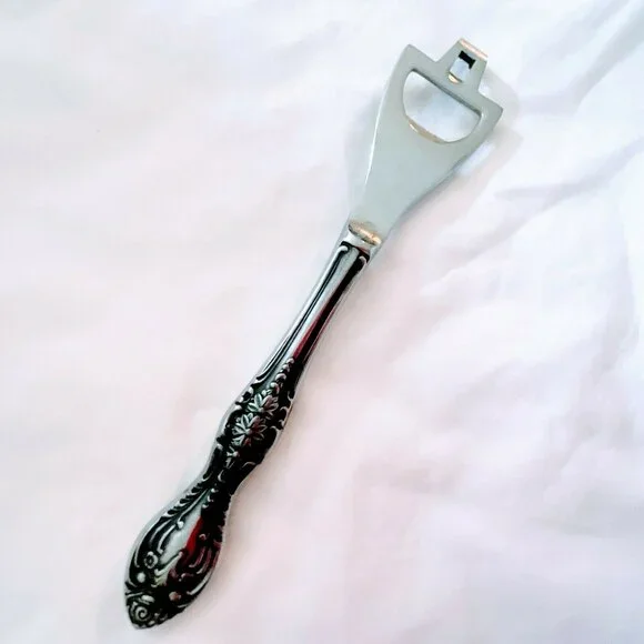 Vintage Stainless Bottle Opener Mid Century long handle Flatware Handle.