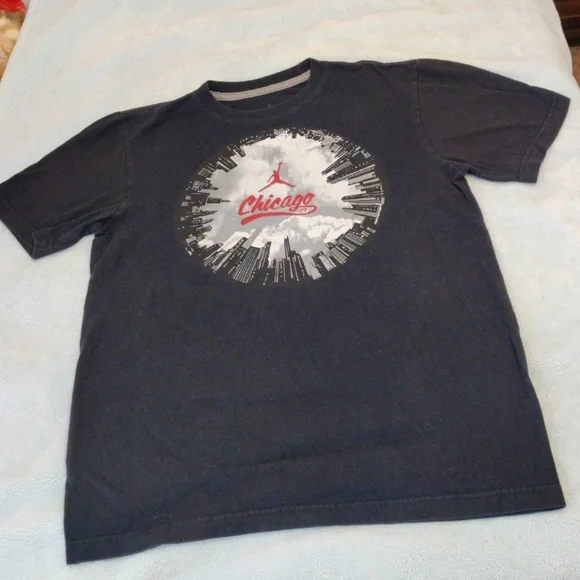 Jordan shirt with Chicago displayed in the middle