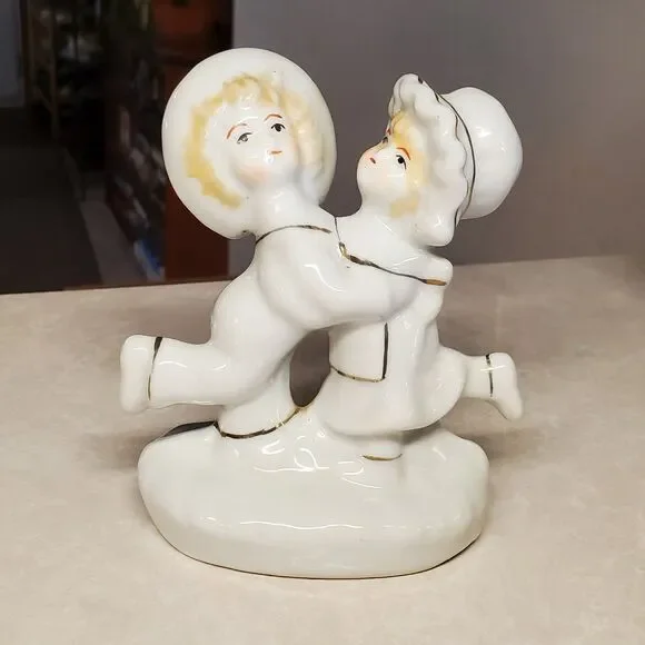 Sophia-Ann Porcelain Dancing Boy and Girl Figurine White with Gold trim.