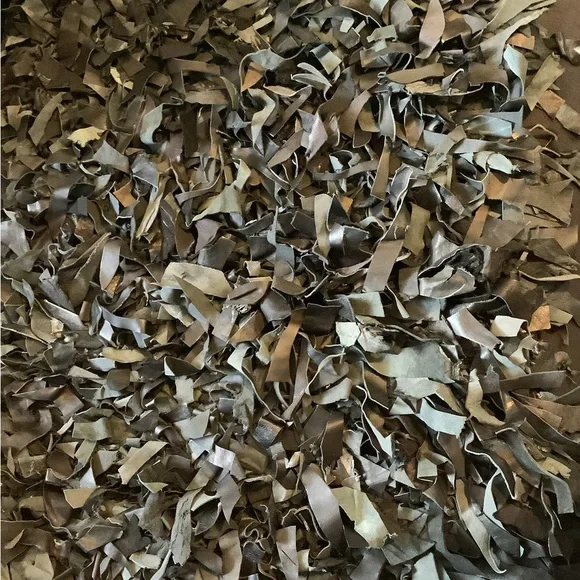 Leather scraps rug 20” by 37 1/2”