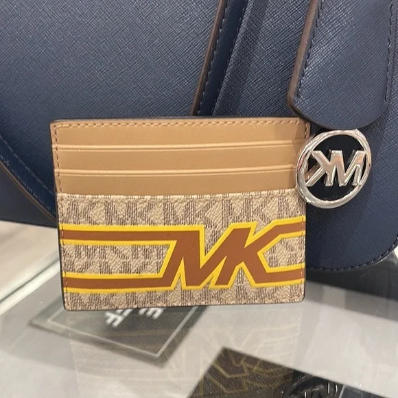 MICHAEL KORS MENS Cooper Graphic Logo Tall Card Case 36S3LCOD2B COLOR: Yellow