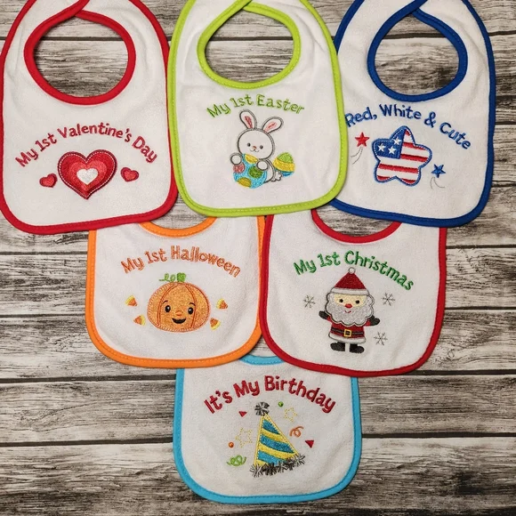 My first holidays embroidered bib set