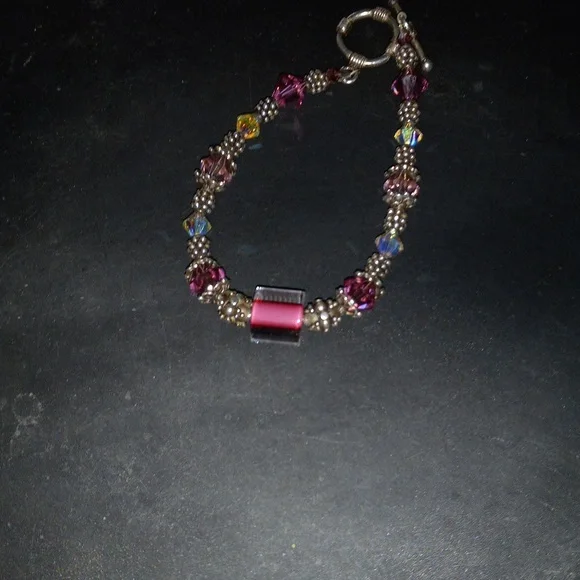 Beautiful handcrafted pinkish red glass and swasvorski crystals beads bracelet
