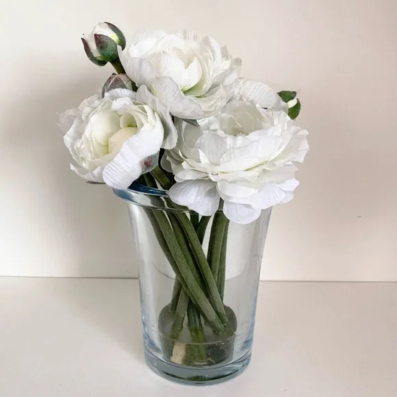Thomas O’Brien Faux flowers in blue glass vase