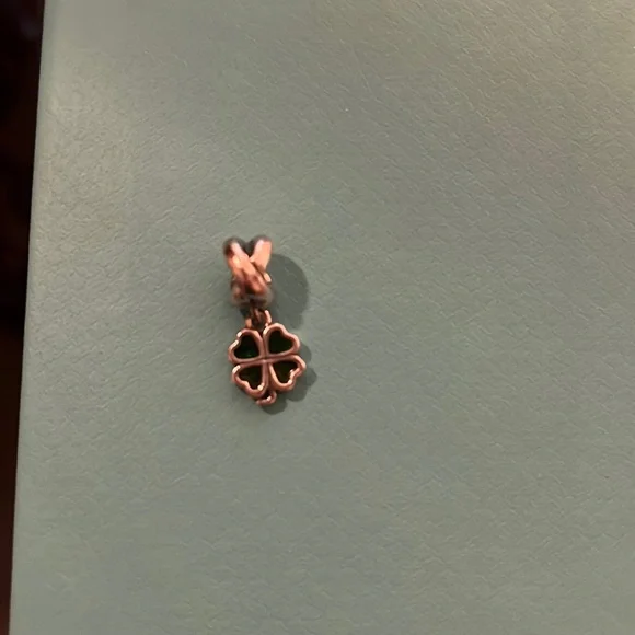 Pandora silver circle crossing charm with dangling 4 leaf clover