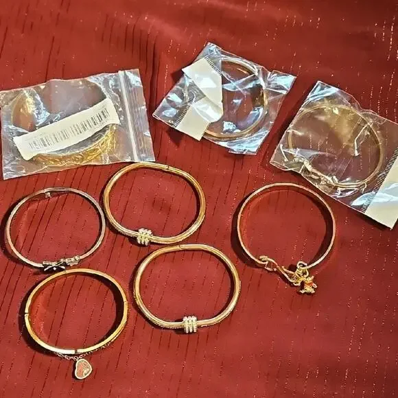 8 Assorted Gold Charm Bracelets