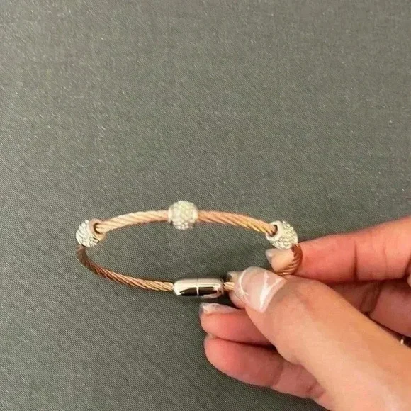 Copper and cubic zirconia bracelet with magnetic closure clasp.