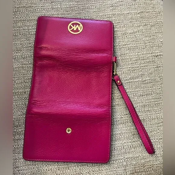 Michael Kors fuchsia multi function wristlet