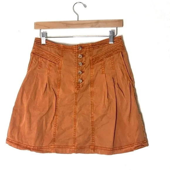 Anthropologie | Briony mini skirt button front burnt orange size 4