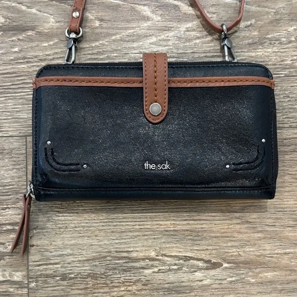 The Sak Large Smartphone Crossbody and Wristlet Leather Wallet Black and Brown