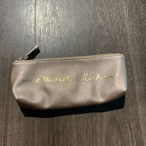 Neiman Marcus “weekend wishes” light pink makeup bag