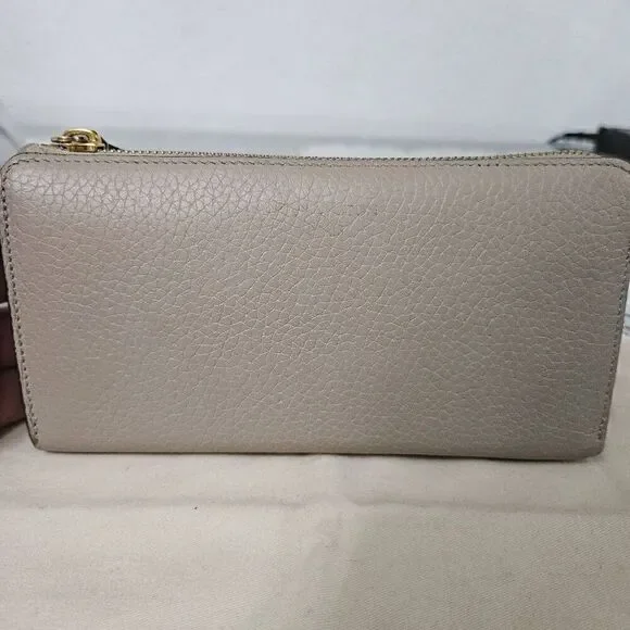 Louis Vuitton Taurillon portefeuille Comete long zip wallet