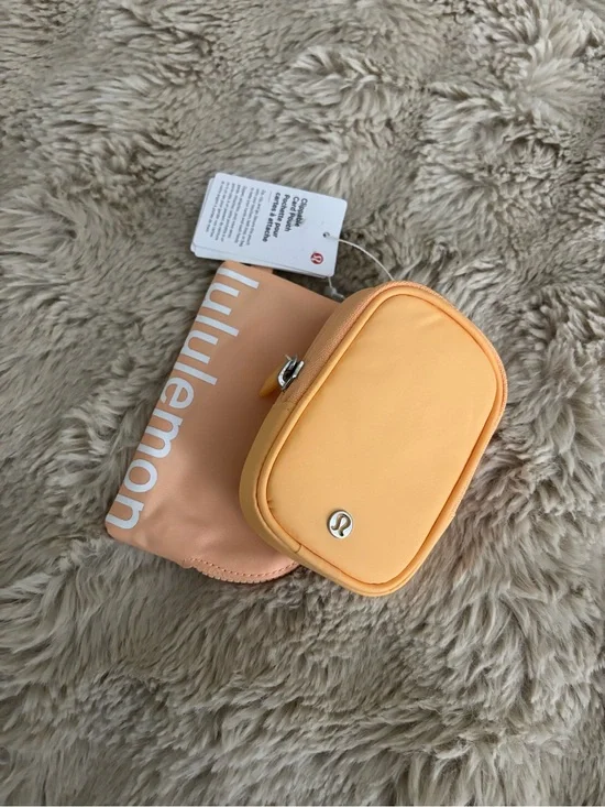 lululemon athletica Peach/Apricot Clipable Nano Small Zip Card Pouch Rock Melon