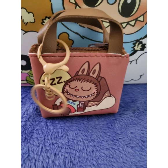 He just taking a nap. Labubu Dusty Rose & Brown Mini Bag charm or Keychain