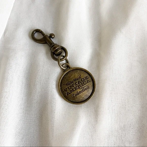 Vintage Nine West Round Brass Finish Key Chain