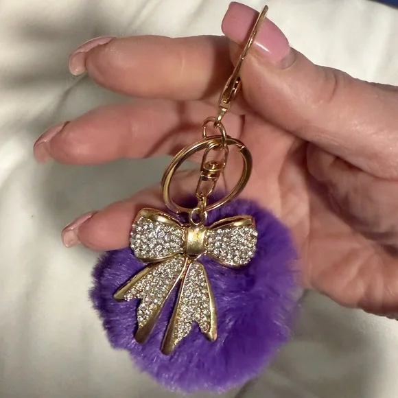 Keychain/Bag charm Purple Fur fluffy with a gorgeous Gold tone Bow!