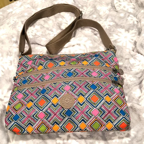 Kipling dual zip wipeable geometric print bag, EUC, 13