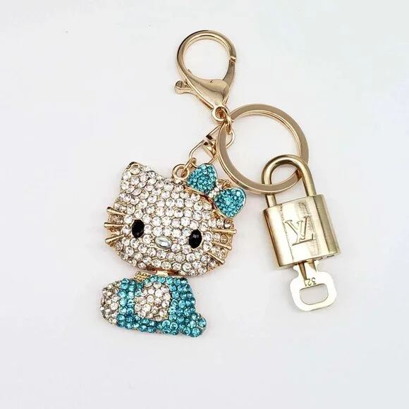 Authentic Louis Vuitton Lock & Key Gold ✨ Unbranded Hello Kitty Keychain/Charm