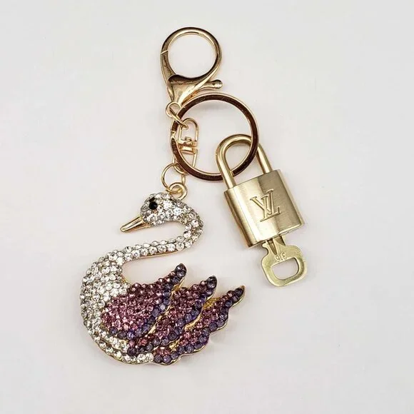 Louis Vuitton Lock & Key with unbranded Swan Bagcharm, Keycharm
