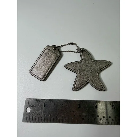 Coach Metallic Silver Leather Star Bag Charm and Logo Hangtag Keychain Accessory