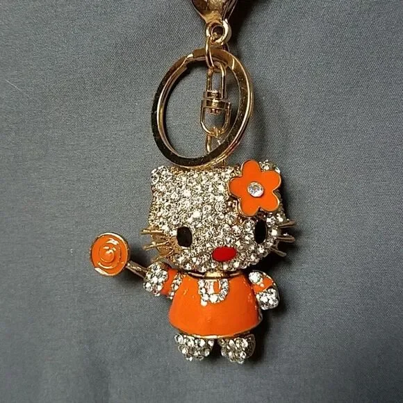 Hello Kitty Orange Lollipop Bejeweled Swivel Keychain