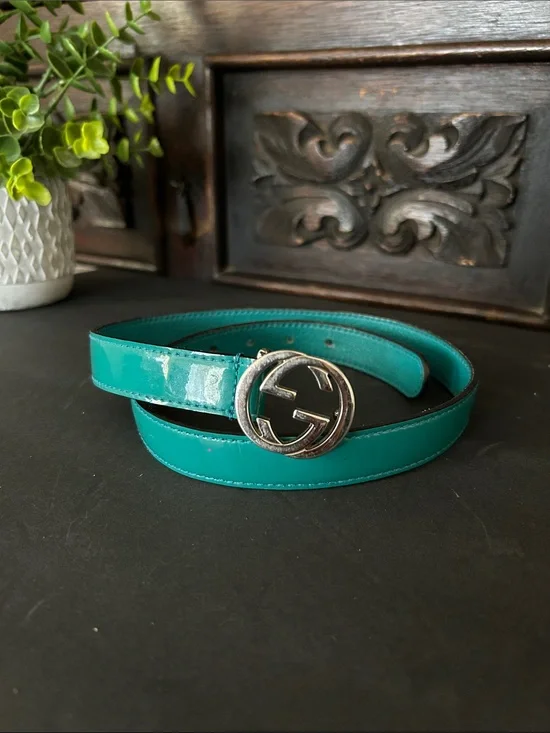 Glossy Teal Patent Leather Belt with Silver Interlocking Buckle