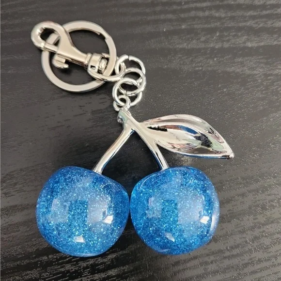 Cherry Blue bag charm w/ silver leafs sparkle shines looks pretty on your purse