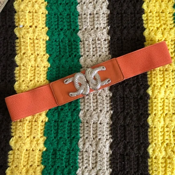 vtg unbranded orange elastic belt best fits L-XL