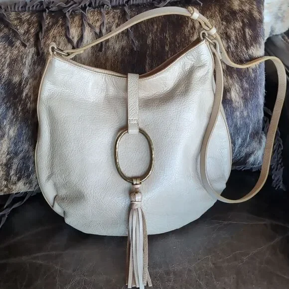 Lucky Brand Cream Colored  Leather With Brass Ring/Tassel Crossbody Bag