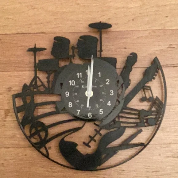 Kinglive battery operated musical montage clock in black and white white. 12”.