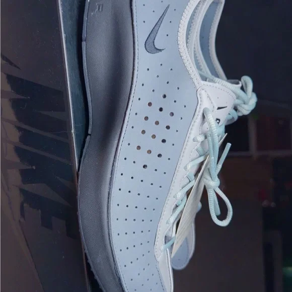 Nike Light Blue and Black Low-Top Perforated Sneaker