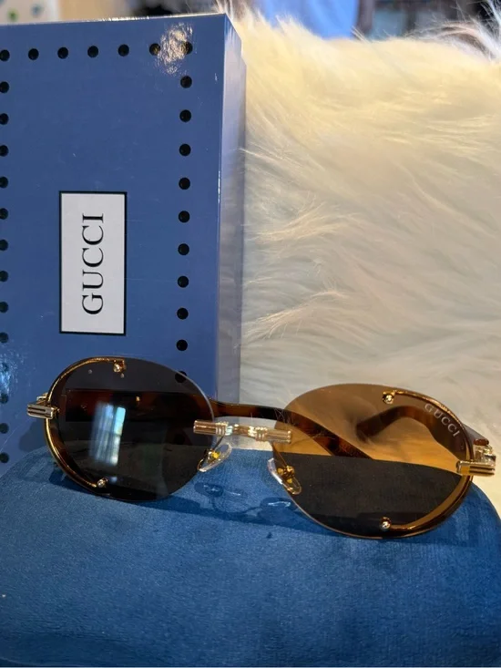 Gucci Brown Rimless Oval Sunglasses with Gold Accents