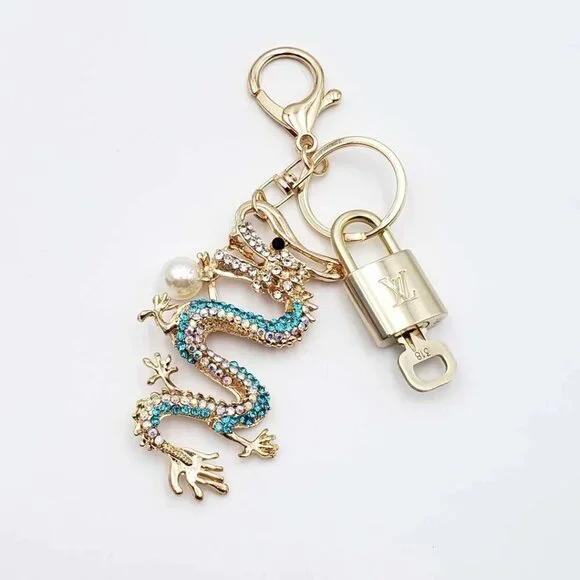 Authentic Louis Vuitton Lock & Key with unbranded Rhinestone Dragon Bagcharm