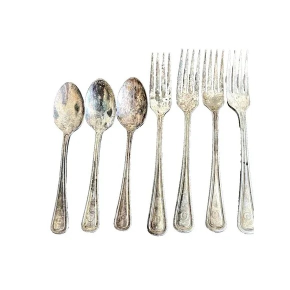 Vintage Wm. A Rogers Hotel Plate Oneida Ltd. 3 Spoons & 4 Forks