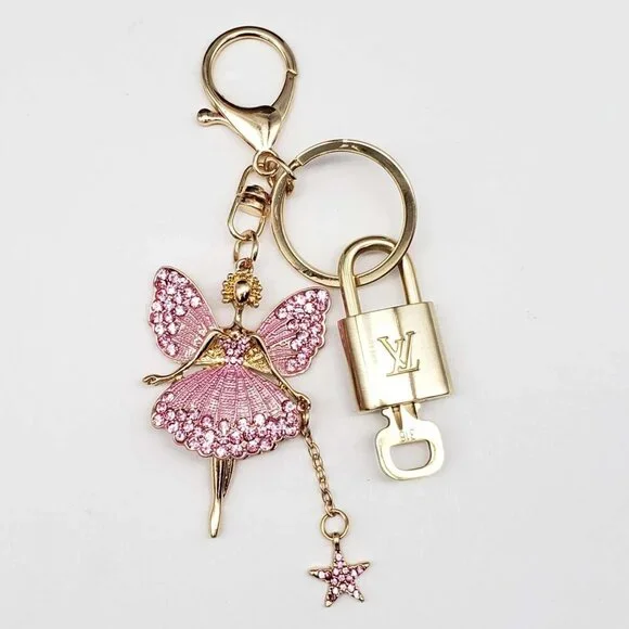 Authentic Louis Vuitton Lock & Key with unbranded Fairy Bagcharm, Keycharm